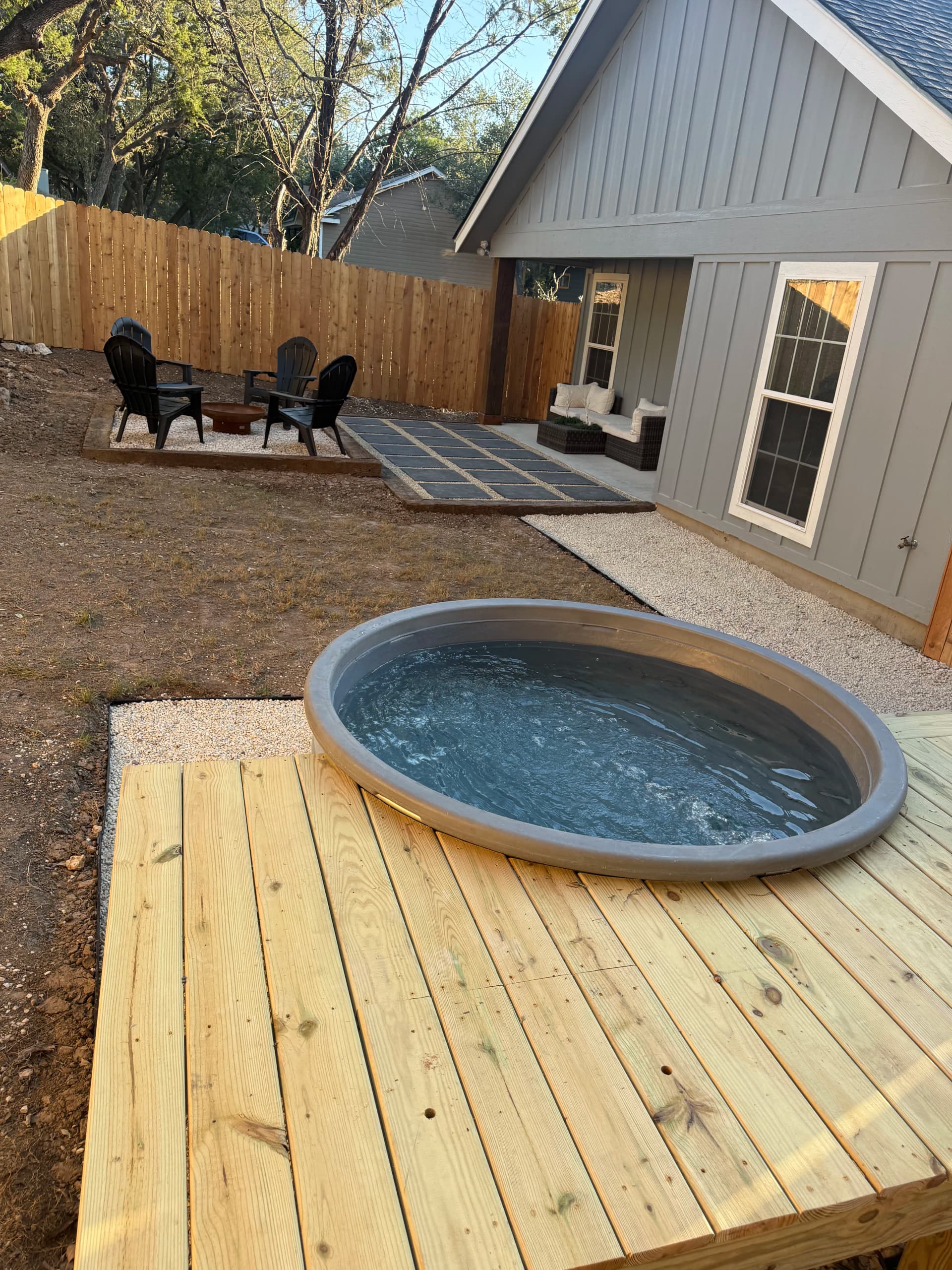 Gallery photos for Paver Patio, Fire Pit, Stock Tank Pool and Cedar Fence Backyard Build: Image #6