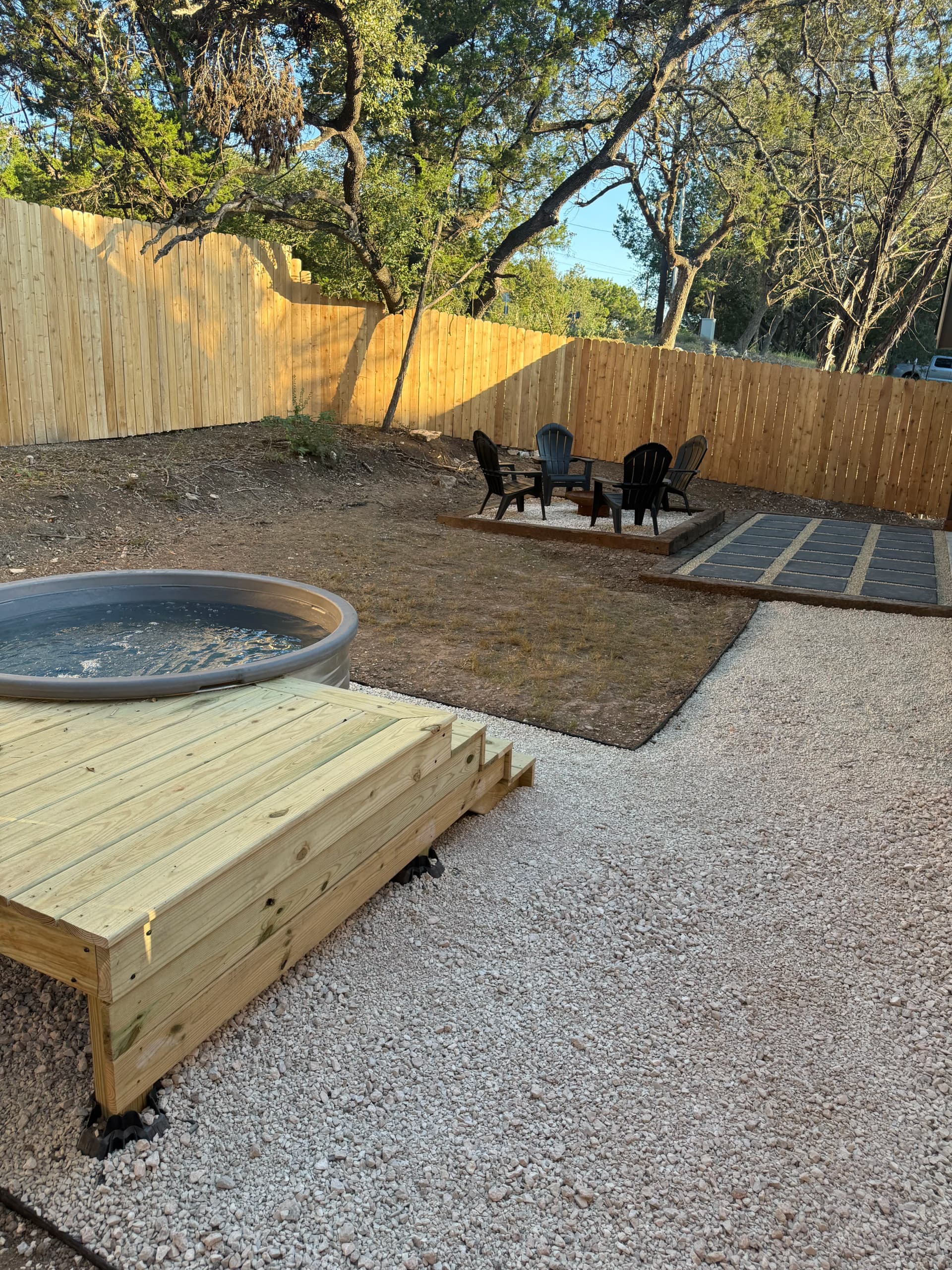 Paver Patio, Fire Pit, Stock Tank Pool and Cedar Fence Backyard Build