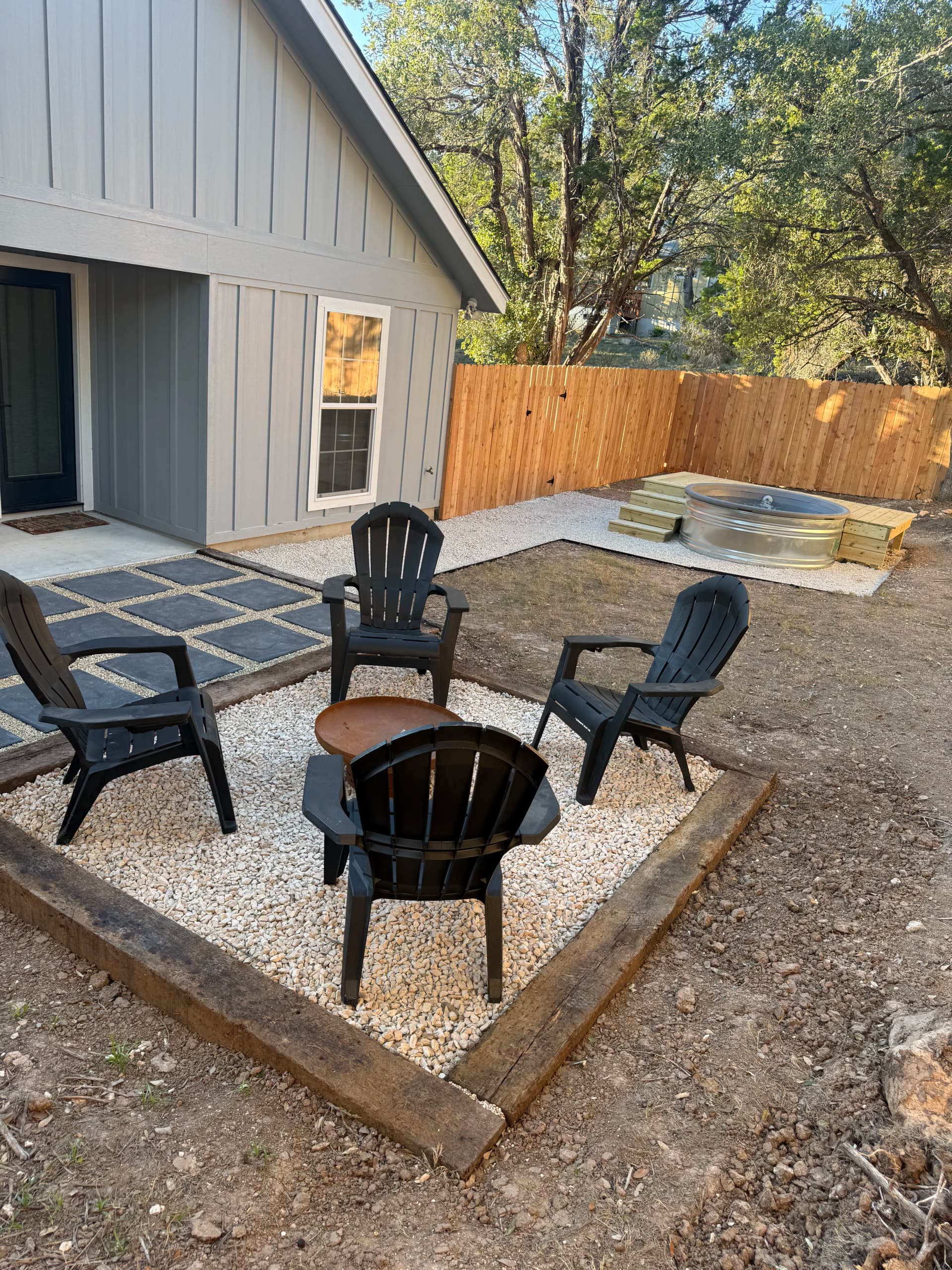 Paver Patio, Fire Pit, Stock Tank Pool and Cedar Fence Backyard Build