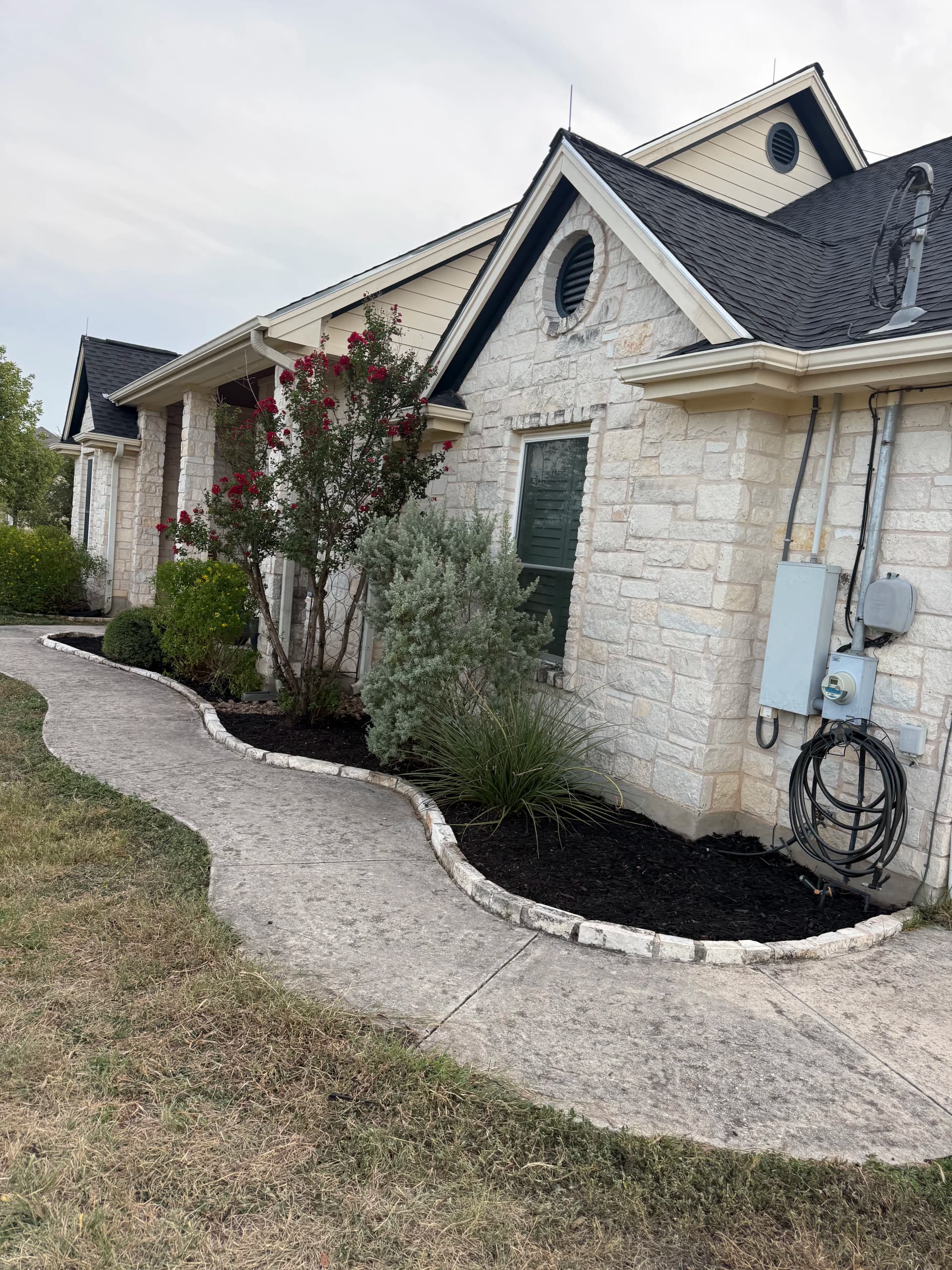Flower Bed Cleanup and Patio Planter Project in Buda Texas image